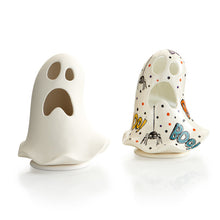 Load image into Gallery viewer, The Ghost Lantern is the spookiest and coolest addition to anyone's Halloween! The ghost sits on a base which holds a tea light perfectly. Simply lift off the ghost to reveal the base. The light illuminates through the eyes and mouth of the ghost for a haunting feel! Don't forget to order our Battery Operated Tea Lights #6432 to have on hand for customers when they purchase a lantern.