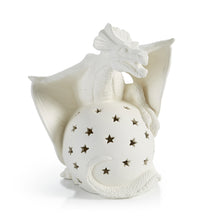 Load image into Gallery viewer, This is the perfect light-up for the dragon or fantasy fan! The detail around the face, wings and scale covered tail make it both unique and noteworthy. This is one of our larger light-ups and it's a jaw dropping statement piece. The star shaped cut outs illuminate the room and cascade a glowing star pattern across the wall. Display it in a bookcase with your fantasy collectibles or use it on a nightstand as a nightlight for the kiddo who's inspired by dragons. Game of Thrones and Harry Potter fans will swo