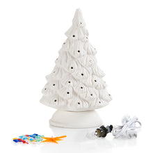 Load image into Gallery viewer, The 11 1/4" ceramic Shelf Christmas Tree is sized just right to fit on a shelf, mantle, windowsill, you name it! Its narrow, including the base, so it sits nicely, but from the front still looks like a regular shaped Christmas Tree. Paint it green, pink, teal, white, or any color you want! It comes with multi-color pin lights and a clip-in light kit (7 watt bulb).