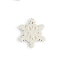Load image into Gallery viewer, This flat snowflake ornament has all the detail you’re looking for in a snowflake, with a flat back ideal for adding a personal message, a name, or simply including the year. Our ornaments are also very versatile. They can be used on a gift as a name tag, around a wine bottle for a decorative accent, and the hole at the top make them easy to hang. FUN TIP: Drill a hole in the side of our napkin holder and attach a string to the ornament. Tie the ornament string through the hole in the napkin holder, and you
