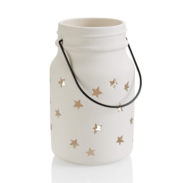 The Large Ceramic Star Jar Lantern is a jumbo version of the  popular jar mug with little star cut-outs all over and a hanger. Add a tea light inside the jar and hang it up or leave it on a table and see a perfect soft glow emit from the stars. It's a great home decor gift to paint for so many occasions. 