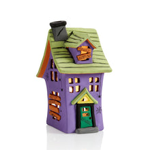 Load image into Gallery viewer, Our Haunted House Lantern is spooktacularly fun to decorate for Halloween! The lantern features a two-story haunted house design with window, door, chimney and slanted board accents.  The haunted house lantern would look so festive on a window sill, mantel, or as a table centerpiece for a Halloween party.  Use with our changing color tea lights #6435 for an eerie glow.
