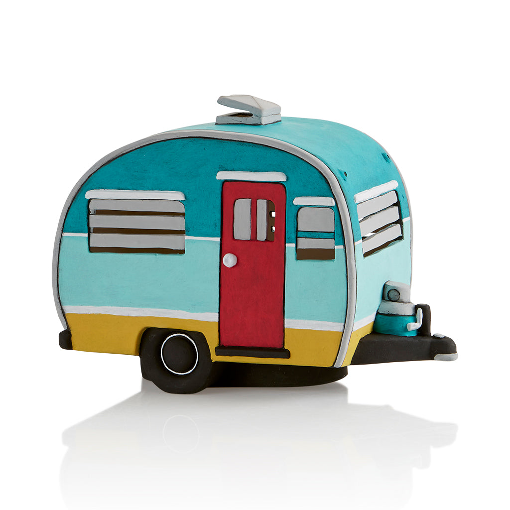 Feeling glampy and a bit retro? Embrace the wonder of the woods with our adorable Vintage Camper Light-Up! Our vintage camper will draw you in and excite you with all its detail!  Jalousie windows and a trailer hitch are just a few of the fun features on this piece! Have fun painting it and display it on a shelf or table. Light it up for some extra ambiance  - light kit included!   