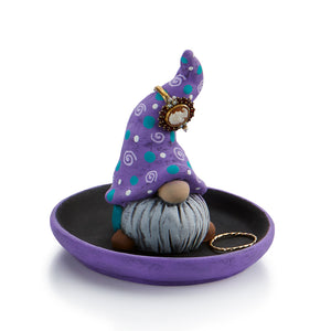 A simple trinket dish with our adorable gnome. Cleverly holds rings around his whimsical hat, and earrings and other jewelry in the dish. Makes for a perfect gift item for birthdays or other special occasions. Perfect piece to paint with Fun Strokes or with Gare's Acrylic Party Paints!