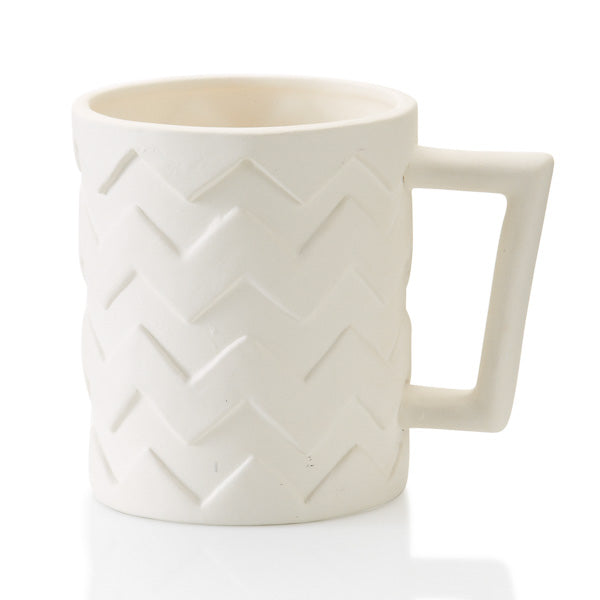Chevron is one of the biggest pottery design trends!  The relief pattern makes painting a breeze, and the size is ideal for all beverages, hot or cold! The unique square handle of this ceramic piece incorporates the angled design and offers a fun element!      